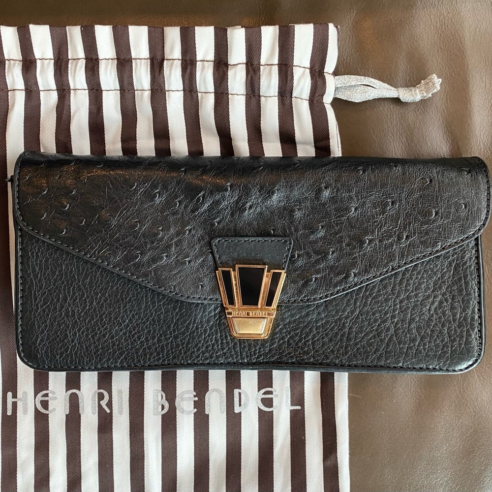 Henri Bendel black ostrich leather with gold hardware clutch